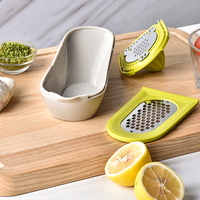 Presse-citron manuel 10-en-1 en acier inoxydable avec zézette, râpe à fromage et à ail, et filtre intégré – Ustensile de cuisine