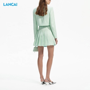 2025 femmes vêtements laine tissu veste et <span class=keywords><strong>jupe</strong></span> plissée en gros mode et élégant 2 pièces <span class=keywords><strong>Blazer</strong></span> costume pour les femmes - Product Image 4