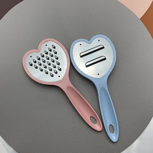 Precio al por mayor: cepilladora resistente de gama alta de acero inoxidable de 4 vías en forma de corazón, mango de PP de diseño clásico y de moda - Product Image 1