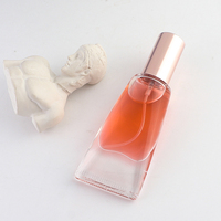 Nouveau design de tube cosmétique en verre en forme de dentifrice, flacon d'huile essentielle de 10 ml avec bille roulante
