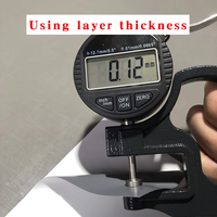 Rouleau de vinyle auto-adhésif en PVC imprimable le plus favorable pour l'impression d'autocollants en verre à colle grise Vinyle adhésif en polymère GMT
