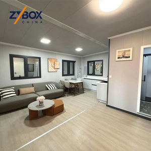 Casa Contenedor Expandible Elevada ZYBOX de 20 pies, con Plataforma de Acero Totalmente Blanca, Prefabricada, Modular, para Parques de Vacaciones Costeros - Product Image 2