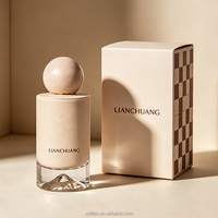 Flacon de parfum cylindrique en verre luxueux, vert, avec bouchon rond en forme de boule, base en forme de montagne, boîte et bouchon personnalisés