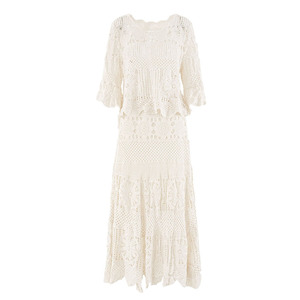 Conjunto de dos piezas de falda larga para mujer, nuevo traje de punto con top de ganchillo hueco y falda amplia, a la moda. - Product Image 2