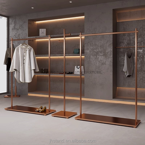 Estante de exhibición <span class=keywords><strong>para</strong></span> tienda de <span class=keywords><strong>ropa</strong></span>, estante de exhibición de <span class=keywords><strong>ropa</strong></span> colgante de acero inoxidable de piso a techo de oro rosa cepillado, estante especial <span class=keywords><strong>para</strong></span> mujer - Product Image 1