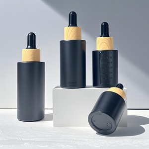 Hot Stamping Embossing 50ml 30ml 1oz Essential Oil <b>Dropper</b> <b>Bottle</b> Frosted Matte Black Cardboard Black Cardboard Jar Recycled - Product Image 3