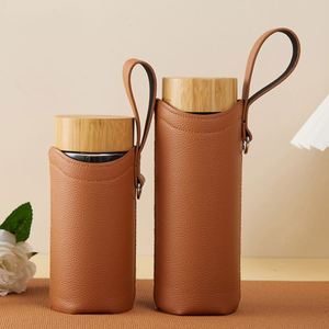 Stylish PU Leather Customizable Durable Portable Water <b>Bottle</b> & Boba Drink Holder with Strap for Promotional Use - Product Image 1