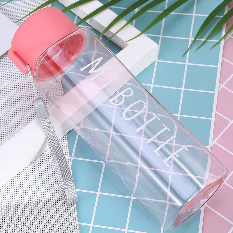 ขวดสีชมพูพร้อมฝากลม