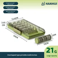 Boîte à pilules verte rectangulaire portable à grande capacité de sept jours avec couvercle, vente chaude transfrontalière, PP de qualité alimentaire, directement de l'usine