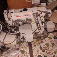 Machine à coudre interlock Pegasus W200 d'occasion, modèle 2015, 7500 max. Vitesse de couture 13 mm, hauteur du pied presseur 250 W, puissance du moteur optimale