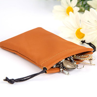 Pochette à cordon en cuir PU de luxe avec logo personnalisé, doublure en faux daim doux, sac d'emballage cadeau pour bijoux, anneaux, cosmétiques