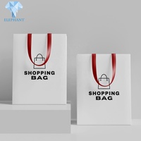 Chinesische Hersteller Günstige Handtasche Schwarz-Weiße Papiertüte mit Logodruck