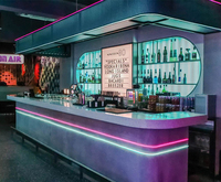 Meubles de discothèque commerciaux Surface solide Texture marbre Comptoir de bar à LED pour hôtel Comptoir de bar en acrylique à LED
