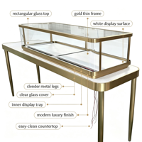 Vitrine de présentation de bijoux rectangulaire de luxe, cadre en métal fin doré, comptoir à bijoux en verre trempé avec éclairage LED, métal élancé
