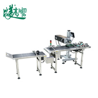 Machine de production tout-en-un entièrement automatique pour le marquage laser CO2 des sachets, avec inspection visuelle CCD et rejet pneumatique des défauts