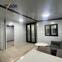 ZYBOX Maison Modulaire Préfabriquée de Luxe Sur Mesure 20ft 40ft, Annexe Extensible en Conteneur avec Toit en Pente et Porche – Marché USA, AU, Canada