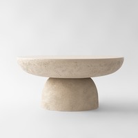 Tables basses rondes en béton d'inspiration naturelle, finition texturée sable Table d'appoint centrale pour un usage quotidien