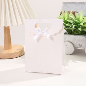 Solid White Cardboard Tote Bag with Bow Design Large Capacity and Customizable Logo Print for Promotional Paper <b>Gift</b> Packaging - Product Image 3