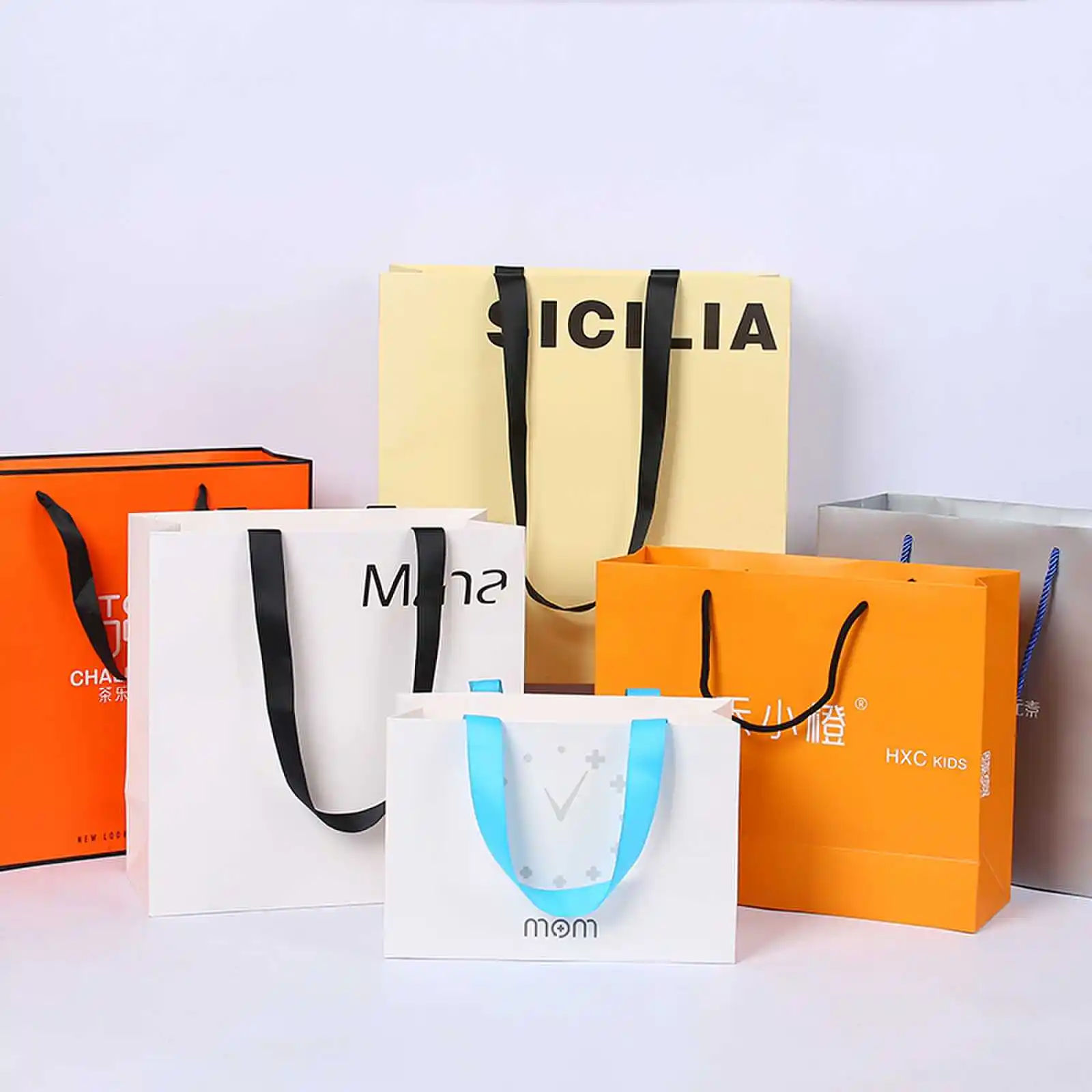 Custom Logo Boutique Embalagem Retail Paper Bags Impresso Garment Euro Tote Bag Gift Bag