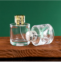 Lot de 100 flacons de parfum en verre transparent de 100 ml, design cylindrique, anti-fuite, avec pompe pulvérisatrice, pour eau parfumée, avec boîte de présentation