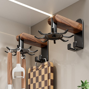 Estante de cocina de madera de nogal para montar en la pared con soporte giratorio para espátulas y almacenamiento para tablas de cortar para un espacio de cocina organizado. - Product Image 1