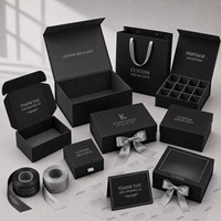 Boîte cadeau magnétique rigide noire personnalisée de qualité supérieure avec logo en relief argenté et insert en EVA pour les ensembles de soins de la peau et les soins masculins