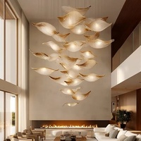Lustre rond en verre de luxe pour salon de villa, lampe en forme de feuille pour hall d'hôtel, restaurant