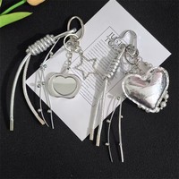 Porte-clés cœur en argent PU exquis pour femmes, pendentif de sac à main pour couple, accessoire de sac à dos en corde tressée, cadeau créatif