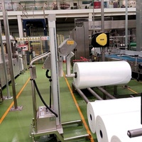 Chariot pratique avec élévateur électrique et mécanisme de préhension à mandrin extensible