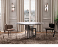 Chaise de salle à manger moderne minimaliste italienne en métal avec accoudoirs en cuir, chaise selle haut de gamme avec dossier de style nordique pour la maison