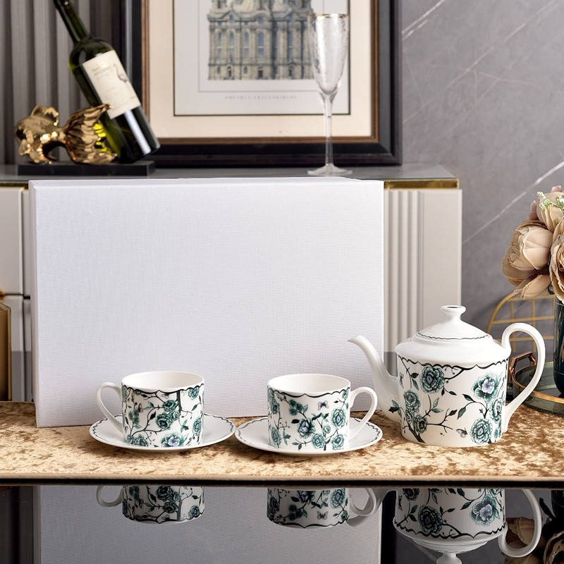 1 pot,2 cup and 2 saucer A