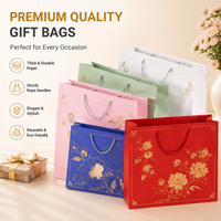 Sac cadeau en papier style chinois avec estampage à chaud doré, motif lanterne et poignée en corde pour l'emballage de mariage ou du Festival de la Mi-Automne