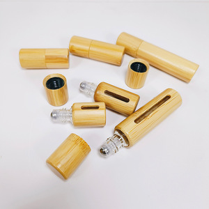 Stock al por mayor disponible en botellas roll-on de bambú de 3ml, 5ml y 10ml con ventanas y tapas de bambú para reenvasado de productos naturales. - Product Image 1
