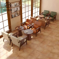 Ensemble de sièges de canapé de restaurant commercial moderne en bois ovale avec revêtement en cuir, table et chaise