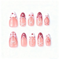 Vente en gros de faux ongles à presser faits main, longs, forme amande, rose et rouge, avec nœud 3D, cœur et perle, pour femmes