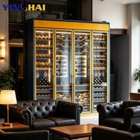 Armoire à vin à température constante en acier inoxydable sur mesure, cadre contrasté bleu et jaune, porte multi-verre, présentoir à vin modulaire
