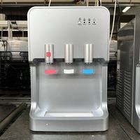 Portable petit distributeur de refroidisseur d'eau de comptoir chaud et froid à chaleur instantanée distributeur d'eau en bouteille de bureau de glace pour le ménage