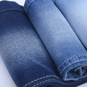 Productos listos para la fábrica Precio bajo 339GSM 10oz B/W Sarga derecha Alta elasticidad Indigo No Slub Jeans Tela de mezclilla con Repreve T0387 #