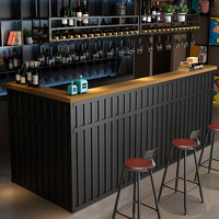 Comptoir de caisse avant en forme de L noir de luxe personnalisé Comptoirs d'accueil de restaurant pour café, bar à vin