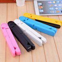 Support de téléphone et de tablette universel pliable triangulaire multifonctionnel en ABS + silicone, nouveau design, pour utilisation sur le bureau
