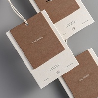 Étiquettes suspendues en papier personnalisées pour usine, étiquettes de vêtements haut de gamme, production de marques imprimées en sérigraphie, Chine