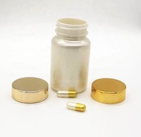 Bouteilles de capsules brillantes 60 capsules emballant des pots blancs perlés avec des couvercles dorés