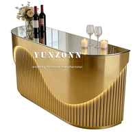 Comptoir de bar et réception moderne au design nouveau 2026, en acier inoxydable doré, tendance