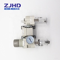 Le régulateur de filtre à AC30A-03G-K-A combiné d'air ZJHD + clapet anti-retour + lubrificateur fournissent une source d'air propre pour l'équipement d'automatisation