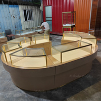 Ensemble de vitrines modulaires en îlot pour la vente en gros, présentoirs à montres éclairés par LED, armoires de rangement verrouillables, comptoirs circulaires pour bijoux