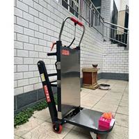 Chariot à plateforme électrique à quatre roues en acier inoxydable pour charges lourdes de 400 kg, adapté aux escaliers