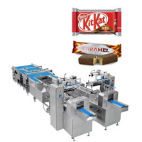 Ligne de machines d'emballage de barres énergétiques et de chocolat entièrement automatique à grande vitesse, machine d'emballage de chocolat