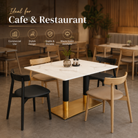 Ensemble de salle à manger, surface en pierre frittée blanche avec colonne à revêtement noir et doré, idéal pour les cafés, restaurants, zones alimentaires et salles de jeux modernes
