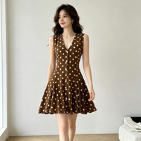 Robe Courte Été 2026 Style Français Femme à Pois Sans Manches Col V Boutonnée Coupe Évasée