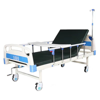Lit médical manuel à deux fonctions de haute qualité avec 2 manivelles pour usage hospitalier et à domicile, garantie 1 an